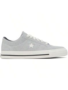 Converse 
Gray One Star Pro Low Top Sneakers 
Low-top suede sneakers in gray. 
. Lace-up closure 
. Logo embossed at tongue 
. Concealed elasticized gusset at tongue 
. Padded collar 
. Logo cutout at sides 
. Perforated detailing at sides 
. Cushioned CX foam insole 
. Canvas lining 
. Rubberized logo patch at midsole 
. Treaded rubber sole 
Supplier color: Ash grey/Egret/Black 
Upper: leather. Sole: rubber. 
Made in Viet Nam. 
241799M237028 
Gray One Star Pro Low Top Sneakers default         S Casual Athletic Shoes, Big Bags, Low Top Sneakers, One Star, Suede Sneakers, Outdoor Shoes, Ash Grey, Maternity Bag, Casual T Shirts