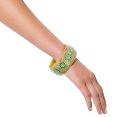 This Mark Davis Collector bangle was created from a richly marbled, soft green, vintage bakelite. Bright green rings of vintage bakelite have been carefully inlaid and are bordered by peridot on the inside and smoky quartz on the outside. All of the gemstones have been bezel-set in 18k yellow gold. This is a beautiful, seasonless piece. Metal 18-Karat Yellow Gold (Au750) Gemstones Peridot 1.60 ctwSmoky Quartz 3.60 ctw Dimensions Inner Diameter 65.00 mm (2.55 in)Inner Circumference 204.20 mm (8.0 Luxury Green Cuff Bracelet For Formal Occasions, Luxury Green Bangle Bracelets, Green Bangle Bracelet For Formal Occasions, Luxury Green Cuff Bracelet As Gift, Green Bangle Bracelets For Formal Occasions, Formal Green Bangle Bracelets, Unique Green Bangle Bracelet, Handmade Green Cuff Bracelets, Green Handmade Cuff Bracelet