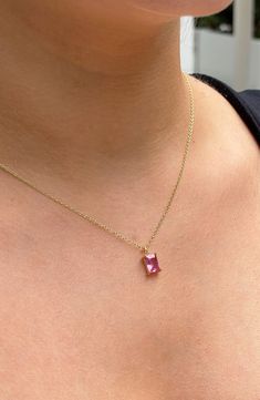 Personalize your everyday look or gift a loved one this colorful birthstone necklace shaped from sterling silver and plated in warm 14-karat gold. 16" length, 1/8" chain width, 2" extender, 1/8" x 1/4" pendant Sterling silver/14k-gold plate/cubic zirconia Imported Pink Birthstone Jewelry Gift, Pink Gemstone Birthstone Necklace In Sterling Silver, Pink Sterling Silver Birthstone Necklace, Pink Sterling Silver Jewelry, Tarnish Resistant, Everyday Pink Sterling Silver Necklace, Pink Gemstone Necklace In 14k Gold, Pink Birthstone Necklace In Sterling Silver, Pink Gemstone Pendant Birthstone Necklace, Pink 14k Gold Pendant Necklace