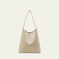 Aesther Ekme "Sac" hobo bag in cotton and faux leather (polyurethane) Shoulder strap  Open top with magnetic closure  Approx. 14.6"H x 14.2"W x 4.3"D Made in Spain Versatile Bucket Bag With Magnetic Closure For Everyday Use, Versatile Everyday Bucket Bag With Magnetic Closure, Daily Use Bucket Bag With Magnetic Closure, Top Handle Hobo Bag With Adjustable Strap For Errands, Everyday Bucket Shoulder Bag With Magnetic Closure, Classic Hobo Bag With Detachable Strap For Shopping, Classic Hobo Bag With Adjustable Strap For Shopping, Modern Everyday Bucket Bag With Magnetic Closure, Classic Large Capacity Hobo Bag For Errands