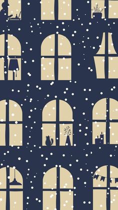 the silhouettes of windows with snow falling all over them and cats sitting in one window sill