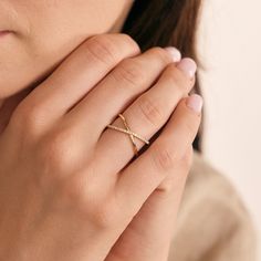 1- D E S C R I P T I O N Stylish and sophisticated, this Diamond Criss Cross Ring in 14K Solid Gold is a must-have for your jewelry collection. Perfect for stacking or wearing solo, this X-shaped ring offers a unique twist on traditional designs. Made with real gold, it's a dainty yet durable piece that makes an ideal gift for any occasion. Discover the allure of this crossover ring today. 2- P R O D U C T ∙  F E A T U R E S * Gold material: 14K solid gold * Gold color options: Yellow gold, Rose gold, White gold * Stone: Diamond Diamond Carat: 0.15 ct. Diamond Clarity: VS2 Diamond Color: F-G Diamond Cut: Excellent * Ring size options: - 5 US/CA - 5 1/4 US/CA - 5 1/2 US/CA - 5 3/4 US/CA - 6 US/CA - 6 1/4 US/CA - 6 1/2 US/CA - 6 3/4 US/CA - 7 US/CA - 7 1/4 US/CA - 7 1/2 US/CA - 7 3/4 US/CA - Criss Cross Ring Diamond, Fine Jewelry 14k Gold Infinity Diamond Ring, 14k Gold Infinity Diamond Ring Fine Jewelry, 14k Gold Diamond Infinity Ring, 14k Gold Infinity Diamond Ring, Infinity Diamond Cut Fine Jewelry Ring, Stylish Gold Rings For Women, Gold Ring Designs Unique For Women, Stylish Rings For Women