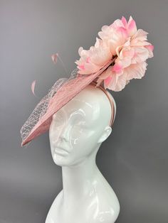 Blush pink sinamay fascinator adorned with two shades of pink blooms. made to be worn on the right side. Fascinators are one size fits all. All Sales are final. don’t forget to follow us on instagram @TheHatHive Pink Feminine Fascinator For Wedding, Pink Evening Fascinator Headband, Pink Headband Fascinator For Evening, Pink Flower Mini Hat Adjustable, Pink Headband Mini Hat For Garden Party, Pink Mini Hat Headband For Garden Party, Pink Adjustable Mini Flower Hat, Spring Adjustable Sinamay Fascinator, Spring Formal Feminine Fascinator