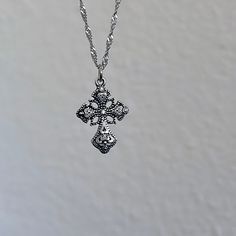 Gift your Christian friend a stunning religious jewelry piece featuring a dainty silver cross necklace, perfect for women seeking minimalist elegance with a touch of religious charm. 𝐃𝐄𝐓𝐀𝐈𝐋𝐒:  ⭐️ Necklace lengths available 14" 16" 18" 20" ⭐️ Pendant size is 1" ⭐️ The silver cross charm is silver plated over alloy. The chain necklace is up on stainless steel, safe for those with sensitive skin ⭐️ Perfect for an everyday dainty cross necklace, The Royal Bliss cross necklace  ⭐️ ALL jewelry Christian Minimalist, Coquette Jewelry, Dainty Cross Necklace, Cross Charm Necklace, Grunge Jewelry, Silver Cross Necklace, Necklace Gothic, Christian Friends, Jewelry Details