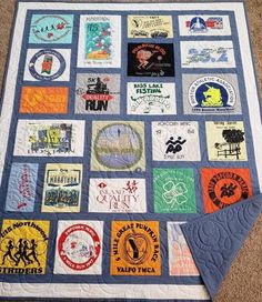 a quilt with many different types of stickers on the front and back of it