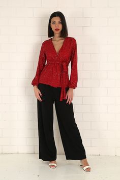 "The red sequined wrap blouse has a modern and stylish look. Our glamorous blouse with its sparkle is an extremely stylish and elegant choice for formal evenings such as cocktails, weddings and all-night/day invitations. The blouse, which is a coupon piece that you should have in your closet, can be combined with sequined twin trousers, baggy and tight classic trousers or jeans. It easily adapts to your body with the shawl model. It is tied around the waist with a belt. S/36 Length from underarm: 43cm/16.9\" Length from Shoulder: 66cm/25.9\" M/38 Length from underarm: 44cm/17.3\" Length from Shoulder: 67cm/26.4\" L/40 Length from underarm: 45cm/17.7\" Length from Shoulder: 68cm/26.8\" XL/42 Length from underarm: 46cm/18.1\" Length from Shoulder: 69cm/27.2\" 2XL/44 Length from armpit: 47cm/ Festive V-neck Evening Blouse, Glamorous V-neck Top For Parties, Fitted Sequined V-neck Blouse, Fitted V-neck Sequin Blouse, Embellished Glamorous Top For Date Night, Glamorous Embellished Top For Date Night, Embellished Tops For Date Night And Party Season, Glamorous V-neck Tops For Date Night, Chic Red Blouse For Evening