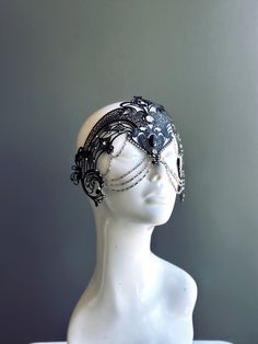 Step into the realm of goddesses with our women's masquerade mask in black. Rhinestones delicately embellish the mask, adding a touch of sparkle. Silver chains gracefully adorn the mask, creating an enchanting movement. Capture attention at any masquerade party, ball, or themed event!


Age Group/Gender - Adult/Women

Size/Type - One size fits all adults

Mask Color - Black

Mask Material - Laser Cut Metal

Special Features - Chains and rhinestones Blind Masquerade Mask, Dark Masquerade Mask, Celestial Masquerade Mask, Adjustable Black Masks For Festivals, Adjustable Eye Mask For Festival, Adjustable Eye Mask For Festivals, Adjustable Gothic Masks For Costume Party, Gothic Masquerade Mask For Carnival Festival, Fantasy Headpieces For Mardi Gras Masquerade