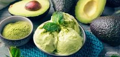 avocado ice cream in a bowl with mint sprinkled on the side