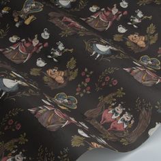 the fabric has many disney characters on it