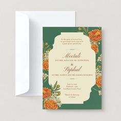 an orange and green wedding card with flowers on the front, featuring a floral border