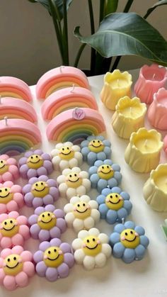 a table topped with lots of different colored candies