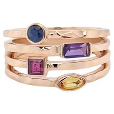 This stunning and luxurious ring has the illusion of a stacking ring. Made out of the finest 18k rose gold and accentuated with mix color and various shaped colored gems. The carefully selected vibrant colored stones can be customized to your preference. The layers on the ring are created from pounded rose gold giving an organic and playfulness perfect for casual or special occasions. This ring will add a touch of glamour and sophistication to any look. Luxury Multicolor Ruby Ring Gift, Colored Stones, Colored Gems, Mix Color, Stacking Ring, Cluster Ring, Stacking Rings, Gemstone Ring, 18k Rose Gold