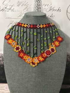 All our pieces are genuine and each bead is handcrafted by artisans from the most representative areas of Huichol art. We only have one piece of each style, choose the option or style that you like and only choose 1 quantity, thank you. Serape Beaded Necklace, Huichol Clothing, Multicolor Flower-shaped Beaded Necklace, Huichol Necklace, Huichol Earrings, Velvet Necklace, Huichol Art, Beaded Collar, Beaded Jewellery