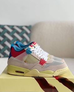 Union LA x Air Jordan 4 'Guava Ice' sneakers with a beige suede upper, vibrant pink, blue, and yellow accents, and vintage-inspired yellow midsole Multicolor Sneakers With Contrast Sole For Streetwear, Multicolor Lace-up Sneakers With Rubber Waffle Outsoles, Yellow Color Block Lace-up Sneakers, Retro Multicolor Sneakers With Rubber Sole, Multicolor High-top Sneakers With Translucent Outsole For Streetwear, Pastel Sneakers With Rubber Sole For Streetwear, Sporty Multicolor High-top Sneakers With Contrast Sole, Pastel Custom Sneakers For Streetwear, Sporty Multicolor High-top Sneakers With Gum Sole