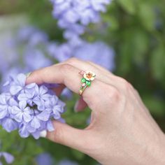 Pear blossoms traditionally represent purity, love, and longevity in Chinese culture and are also considered one of the most beautiful flowers when they are kissed with raindrops, sometimes used to describe attractive women, further promoting the flower's feminine nature. The ring features pear blossoms and leaves that wrap around your finger, detailed with bright enamel for lovers of colour! The perfect accessory for spring and summertime, or to keep the floral vibe going all year round.Carat W Pear Blossom, Most Beautiful Flowers, Chinese Culture, Quality Jewelry, Pear, Sterling Silver Rings, Beautiful Flowers, Most Beautiful, Blossom