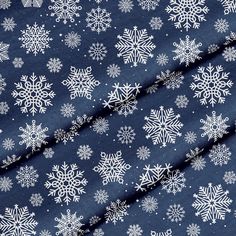 a blue and white snowflake print fabric