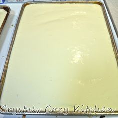 two pans filled with batter sitting on top of a counter