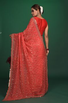 Be a vision of elegance at parties in this exquisite red bandhej and sequin georgette saree. It comes with a matching blouse piece. Shop designer sarees online in USA from Pure Elegance. DISCLAIMER:- The shown stitched blouse on the model is for display purpose only. The saree comes with a matching blouse piece and finished with fall and piko. Festive Bandhani Print Georgette Pre-draped Saree, Reception Georgette Dupatta With Bandhani Print, Red Georgette Pre-draped Saree With Pallu, Traditional Georgette Pre-draped Saree With Sequins, Georgette Bandhani Print Dupatta For Reception, Reception Dupatta In Georgette With Bandhani Print, Elegant Designer Wear Dupatta With Bandhani Print, Elegant Bandhani Print Dupatta For Designer Wear, Traditional Bandhani Print Saree For Reception