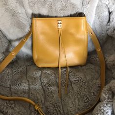 Beautiful New Small Darren Rebecca Minkoff Bag With Tags And Dust Bag. Comes With An Adjustable Strap For Crossbody Or Shoulder Wear. Top-Quality Leather Clasp Closure, Interior Has A Large Zipper Pocket Exterior Has A Large Open Pocket. Color Is Ambra Tan Bucket Shoulder Bag With Removable Pouch, Tan Shoulder Bag With Detachable Strap For Everyday Use, Tan Bucket Shoulder Bag With Dust Bag, Tan Flap Bag With Removable Pouch For Everyday Use, Tan Satchel With Adjustable Strap, Everyday Tan Flap Bag With Removable Pouch, Tan Satchel Flap Bag With Adjustable Strap, Tan Box Bag With Detachable Strap For Everyday Use, Tan Bucket Bag With Detachable Strap For Shopping