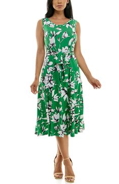 A vibrant printed midi dress is perfect for summer events. Fit: this style fits true to size. 50" length (size Medium) Crewneck Sleeveless Attached waist tie 95% polyester, 5% spandex Machine wash cold Imported Model stats: 5'10", 32" bust, 25" waist, 36" hip. Model is wearing size Medium. Printed Sleeveless Dress For Garden Party, Summer Printed Sleeveless Dress For Garden Party, Summer A-line Maxi Dress With Tie Waist, Summer Garden Party Printed Sleeveless Dress, Printed Sleeveless Dress For Spring Garden Party, Spring Printed Sleeveless Dress For Garden Party, Sleeveless Midi Dress For Summer Garden Party, Summer A-line Printed Midi Dress, Spring Printed Sleeveless Midi Dress