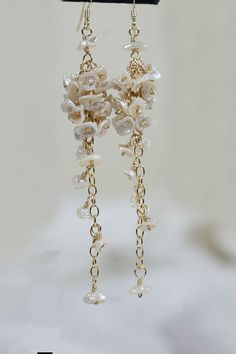 Bridal Pearl Earrings Keishi Pearl Earrings Wedding by Trendydeals White Pearl Drop Dangle Cluster Earrings, White Pearl Drop Cluster Earrings, Pearl White Long Drop Pearl Earrings, Long Drop Pearl White Pearl Earrings, Cream Dangle Jewelry For Wedding, Pearl White Pearl Dangle Chandelier Earrings, Pearl White Dangle Chandelier Earrings, Single Pearl Dangle Bridal Earring, Long Drop Pearl Earrings With Dangling Beads For Wedding