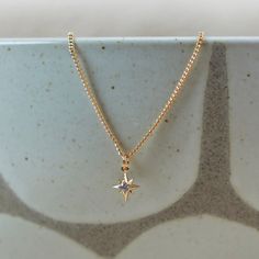 When you feel lost, remember the north star. This necklace and pendant will help you find your way and orient yourself. With its gold and cubic zirconia design, this accessory is the perfect addition to your outfit. Color: Gold Size: 14" + 3" Extender Material: 18K Gold Bonded - Cubic Zirconia Origin: Made in the U.S. North Star Pendant, Gold Star Necklace, When You Feel Lost, North Star Necklace, Feel Lost, House Items, Star Necklace Gold, The North Star, Find Your Way