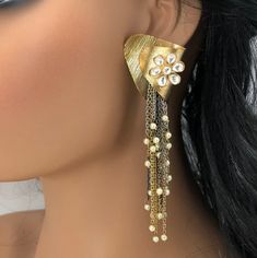 Matte Gold Jhumka/Indian Jhumka/Golden Pearl Jhumka/Traditional Jhumka/Ethnic Golden Matte/Gold finish earrings/Ethnic Indian Long Jhumka Length: Approx. 4.5 Inches This pair of earring is made in Matte Gold finish with Semi precious stone beads with Push back closure. Very Elegant and stylish, these earrings can be paired with any traditional Indian or Western Attire depending upon the occasion and the theme. Very lightweight, hand carved and made with with extreme love and care. This earring w Bohemian Dangle Clip-on Earrings For Party, Unique Beaded Earrings For Festive Occasions, Bohemian Drop Clip-on Earrings For Wedding, Unique Festive Beaded Earrings, Festive Single Dangle Pearl Earring, Traditional Single Earring For Party, Unique Single Earring For Festive Occasions, Elegant Drop Clip-on Earrings With Latkans, Traditional Single Dangle Clip-on Earring