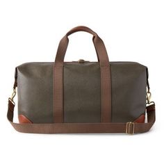 Nothing says 'classic Mulberry' like our Scotchgrain luggage collection. Its beautifully textured surface is accented by smooth leather trim. Travel pieces should be built to last, and look good while doing it. A timeless travel bag in a medium size, this clipper has two short handles and a detachable shoulder strap. Leather trim detailing Two canvas handles with leather detailing Detachable and adjustable canvas shoulder strap Metal feet at the base of bag Detachable luggage tag Internal Mulber Classic Cognac Travel Bag With Leather Lining, Classic Cognac Travel Bag For Business, Classic Cognac Travel Bag For Business Trips, Classic Cognac Business Travel Bag, Classic Cognac Weekender Bag With Leather Lining, Classic Brown Travel Bag With Luggage Sleeve, Elegant Cognac Travel Bag With Luggage Sleeve, Classic Cognac Business Duffle Bag, Brown Leather-lined Weekender Bag For Business Trips