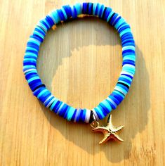 blue starfish keychain. Blue Star Jewelry For Vacation, Blue Star Shaped Jewelry For Vacation, Blue Beaded Bracelet With Starfish Charm As Gift, Blue Starfish Bracelets For Summer, Blue Nautical Jewelry For Beach, Ocean-inspired Starfish Bracelets As Gifts, Blue Starfish-shaped Beaded Bracelets As Gift, Star-shaped Bracelet With Starfish Charm Gift, Sea Starfish