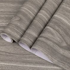 a close up view of a wood grained wallpaper