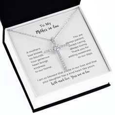 Sharing your faith has never been easier than with this gorgeous gift. The CZ Cross necklace is the perfect present for baptisms, birthdays, and every celebration in between. This stunning piece is white gold dipped, crafted with high-grade CZ crystals, and finishes in a sturdy lobster clasp. Your special someone will be delighted when you add this meaningful element into their wardrobe. This piece is lovingly packaged in either a soft touch box or mahogany style luxury box for easy gifting. Pro Mother's Day Birthday Gift Wrapped Necklace, Gift-wrapped Necklace For Birthday On Mother's Day, Silver Cross Necklace For Father's Day Gift, Mother's Day Gift Necklace With Hallmark, Inspirational Necklace For Mother's Day Gift, Mother's Day Inspirational Jewelry With Gift Box, Mother's Day Gift-wrapped Necklaces, Inspirational Jewelry For Mother's Day With Gift Box, Inspirational Mother's Day Gift Necklace