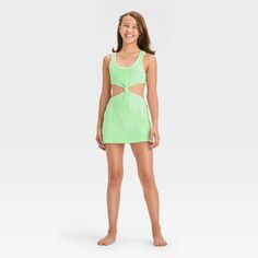 Your kiddo can layer their swimsuit while lounging on the beach or returning home from their swim session with this Solid Terry Cover-Up Dress from art class™. This sleeveless cover-up dress in a solid color features a center knot detail along with cutout sides and back for a stylish, breezy look. The cotton-blend terry fabric offers a cool and comfortable fit, while the pullover style allows for easy wear. Plus, the UPF 50+ rated finish offers added protection from UV rays. Welcome to art class Target Gifts, Sewing Party, Terry Fabric, Art Dress, Swimsuit Cover Ups, Cover Up Dress, Art Class, Uv Rays, Easy Wear