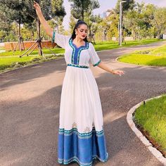 Striking Blue Habesha Dress Holiday Wedding Dress, Habesha Dress, Ethiopian Dress, Colorful Embroidery, Cultural Celebration, Holiday Wedding, Wedding Dresses Simple, White Fabric, Geometric Patterns