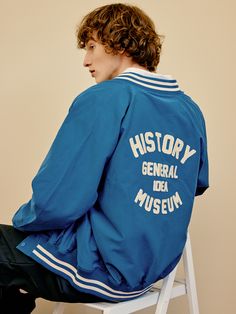 Editor's notesIt is a casual stadium jacket in polyester blend cotton fabric. The jacket features soft touch and semi-glossy texture. It has lettering graphic on the back and stripes on neck, cuffs, and hem. The colorblock point in classic mood and matte spring snap button add vintage and classic vibe.- Standard fit- Ribbed neck, cuffs, hem- Side pockets- Snap button closureMeasurements(in.)M / L- Center back to sleeve hem: 32.3 in. / 35.4 in.- Chest: 22.4 in. / 24.4 in.- Hem: 13.8 in. / 16.5 in Retro Cotton Sports Outerwear, Retro Cotton Outerwear For Sports, Cotton Track Jacket With Baseball Collar For College, College Style Cotton Outerwear With Baseball Collar, Cotton College Style Outerwear With Baseball Collar, Sporty Cotton Outerwear With Baseball Collar, Collegiate Long Sleeve Track Jacket With Letter Print, Retro Cotton Varsity Jacket With Letter Print, Cotton Varsity Outerwear With Baseball Collar