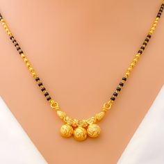 Reflective Triple Thali 22k Gold Mangal Sutra Black Round Beads Jewelry For Diwali, Black Temple Necklace As Festive Gift, Black Temple Necklace Gift For Festive Season, Black Temple Necklace For Festive Gift, Festive Black Temple Necklace As Gift, Elegant Black Temple Necklace For Festive Occasion, Black Round Beads Necklace For Diwali, Black Temple Jewelry Necklaces For Puja, Black Temple Jewelry Necklace For Puja