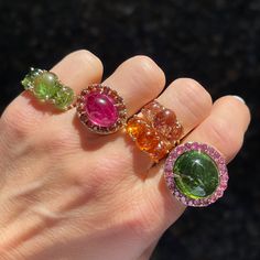 There are many color combinations that bring out the best in each other. But, nothing quite soothes my sparkle-loving soul like pink and green. The pink sapphire perfectly frames the gorgeous green tourmaline center stone. This ring is a statement and knows how to garner attention. Available in 14k yellow gold 24.81ctw tourmaline 3.5ctw pink sapphire Measures 19.2mm x 16mm By M. Spalten Colorful Rings, Symbolic Jewelry, Orange Sapphire, Gold Eyes, Funky Jewelry, Tourmaline Ring, Bling Rings, Custom Jewelry Design, Green Tourmaline