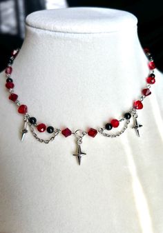 This necklace is made of sterling silver, red & black beads, with silver stars! It's perfect for a gift or to add to your own jewelry collection. These look absolutely beautiful in the sun and make great accessories for your outfits :) Would be perfect for the fall and winter season coming up! Red Black Beaded Necklace, Christmas Beaded Necklace, Christmas Bead Necklace, Skz Concert, Store Inspiration, Necklace Inspiration, Edgy Jewelry, Winter Jewelry, Gothic Necklace