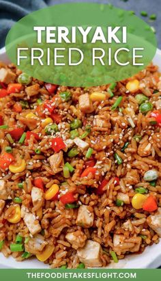 a plate full of fried rice and vegetables with the words teriyaki fried rice above it