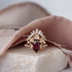 a close up of a ring on a piece of cloth