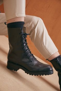 The Low Roma Boot is a classic combat-inspired boot silhouette. A boxy sculpted square toe and lug sole make this style feel powerful and quietly commanding while a tailored shaft makes it feel chic. Boot Silhouette, Winter Styling, Feel Powerful, Winter Socks, Lug Sole, Vegetable Tanned Leather, Cotton Lace, Soft Black, Lace Up Boots