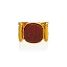 Classical elegance always attracts my eye.  This beautifully detailed and crafted signet is a refined example of jewelry crafted in England during the Victorian period that referenced architectural and ancient findings of the century before from ruins found at Pompeii and Herculaneum.  This hand crafted 18KT Gold ring with an engraved tablet of carnelian sports a warrior on horseback. A quintessential style of this period.  3 bands of warmly hued gold showcase a central cushion shaped tablet and 2 torpedo shaped shoulders on each side.  Elegant and strong.  A true statement signet.   Not marked but tested 18KT. 7.9 grams.  Size 5.5  but can be resized within reason. Antique Carnelian Intaglio Rings, Ancient Intaglio Ring Jewelry, Antique Ceremonial Signet Ring With Intaglio, Antique Intaglio Signet Ring For Ceremonial Occasions, Antique Carved Signet Ring For Ceremonial Use, Elegant Gold Signet Ring With Carnelian, Antique Intaglio Ceremonial Jewelry, Vintage Ceremonial Intaglio Engraved Ring, Antique Intaglio Jewelry For Ceremonial Occasions