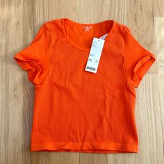 Brand New With Tags Orange Urban Tee Urban Outfitters Orange Tops For Fall, Affordable Urban Outfitters Crop Top T-shirt, Urban Outfitters Stretch Short Sleeve T-shirt, Stretch Urban Outfitters T-shirt, Urban Outfitters Orange Sleeveless Top, Urban Outfitters Shirt, Crop Top Camisole, Short Sundress, Urban Tees