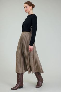 This A-line Plaid Midi Skirt boasts a comfortable elasticized waist and charming pleats that add effortless movement to your look. Pair with the matching jacket or a simple tee for a versatile outfit that transitions seamlessly from warm to cooler days. Expertly crafted for a stylish and comfortable fit. pleated elasticized waist camel multicolor midi length 100% polyester