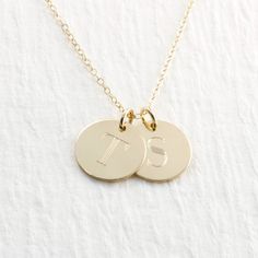 "Gorgeous double solid gold initial necklace... the perfect gift! PICTURE IS ENLARGED TO SHOW DETAIL! PLEASE READ BELOW FOR ACTUAL MEASUREMENTS!! Two solid gold 1/2\" discs have been personalized just for you with my 7mm typewriter font. The pendants are engraved with your choice of letters (entire alphabet in typewriter font shown in second picture) They hang from a solid 14k gold 1.5mm cable chain in either 16, 18, or 20\" in length. PLEASE REMEMBER PICTURES ARE TAKEN CLOSE UP TO SHOW DETAIL. Classic Necklaces With Initial Pendant For Anniversary, Classic Necklaces For Anniversary With Initial Pendant, Gold Monogram Initial Necklace For Formal Occasions, Gold Monogram Initial Necklace For Formal Events, Personalized Yellow Gold Necklaces For Anniversary, Classic Gold Charm Necklaces With Polished Finish, Personalized Yellow Gold Necklace For Anniversary, Formal Yellow Gold Initials Name Necklace, Classic Yellow Gold Initial Necklace For Personalized Gift