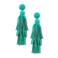 two pairs of turquoise beaded earrings with long tassels on each earring