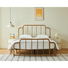 a bed that is in a room with white walls