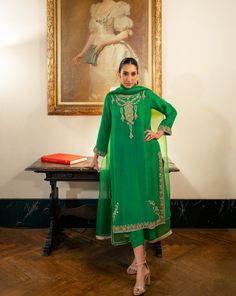 3 piece suit comes with matching pants, and dupatta. Shirt length: 45 inches The shirt and pants are made of pure raw silk and the dupatta is organza. This item includes the following handwork: aari, kora, and zardozi with pearls, sequins, and resham thread. This outfit including the sleeves is not see through. Orders cannot be changed or cancelled after 30 minutes of completion of the order. We do not offer returns or exchanges on this item. We cannot make any exceptions to this policy since th Semi-stitched Tissue Silk Palazzo Set With Zari Work, Anarkali Tussar Silk Palazzo Set, Designer Anarkali Tussar Silk Palazzo Set, Bollywood Style Tussar Silk Palazzo Set With Resham Embroidery, Tussar Silk Sets With Sheer Dupatta In Traditional Drape, Designer Tussar Silk Palazzo Set With Sheer Dupatta, Traditional Tussar Silk Palazzo Set With Sheer Dupatta, Chanderi Palazzo Set With Sheer Dupatta, Tussar Silk Palazzo Set With Sheer Dupatta For Festivals