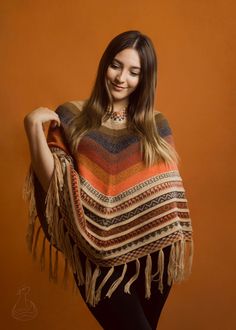 "Luxurious Alpaca Poncho from the Peruvian Andes.  Garments and accessories from alpaca have exceptional quality, this wool is considered one of the finest fibers in the world, it is pleasant to the touch, fine, silky, and comfortable.  Dressing alpaca clothing is support an eco-friendly and sustainable industry. Alpaca fiber is still made using ancient techniques respectful of the environment and the planet. It is a renewable resource and 100% biodegradable. Located in the Peruvian Andes, the alpacas are breeding from ancient times, living in large herds grazing on the plateau, and are known as \"the true treasure of the Incas\". Sizes:  XS - S - M - L - XL Send us a message with a specific size and color combination if you looking for a custom measure. We knit custom-made requests. Compo Peruvian Design, Peruvian Poncho, Poncho For Women, Alpaca Clothing, Alpaca Poncho, Ladies Poncho, Wool Poncho, Alpaca Fiber, Alpaca Sweater