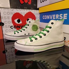 Converse / Ctas Hi Size: Uk 10/ M 10/ W 12 Color: White/Green Condition: Brand New!! The Shoes Come From The Factory With A Distressed Look. Green Cotton Sneakers With Gum Sole, White Mid-top Canvas Shoes For Streetwear, White Canvas Shoes With Branded Insole For Streetwear, White Canvas Shoes For Streetwear With Branded Insole, White Canvas Shoes With Gum Sole For Streetwear, Green Converse Cotton Sneakers, Urban White Canvas Shoes With Vulcanized Sole, Green Cotton Converse Sneakers, Casual Green Cotton Sneakers