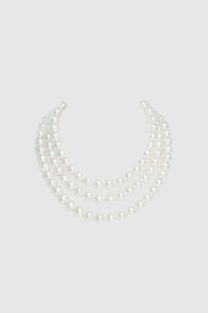 This sumptuous piece of jewelry features a retro-elegant yet slightly modern style that complements the lavish garments, reminiscent of the roaring 1920s. Features: Lustrous imitation pearls Three strand design 16.9 inch / 43cm, 18.1 inch / 46cm, 19.7 inch / 50cm long 6mm, 8mm, 10mm pearls Classic Pearl Necklace With Pearl Chain For Parties, Classic Pearl Chain Necklace For Party, Classic Pearl Necklace For Party, Classic Pearl Drop Necklaces For Party, Classic Pearl Drop Necklace For Party, Elegant Party Necklaces With Round Beads, Elegant Formal Beaded Necklace With Pearl Chain, Elegant Formal Pearl Chain Beaded Necklace, Classic Pearl Embellished Necklaces For Party